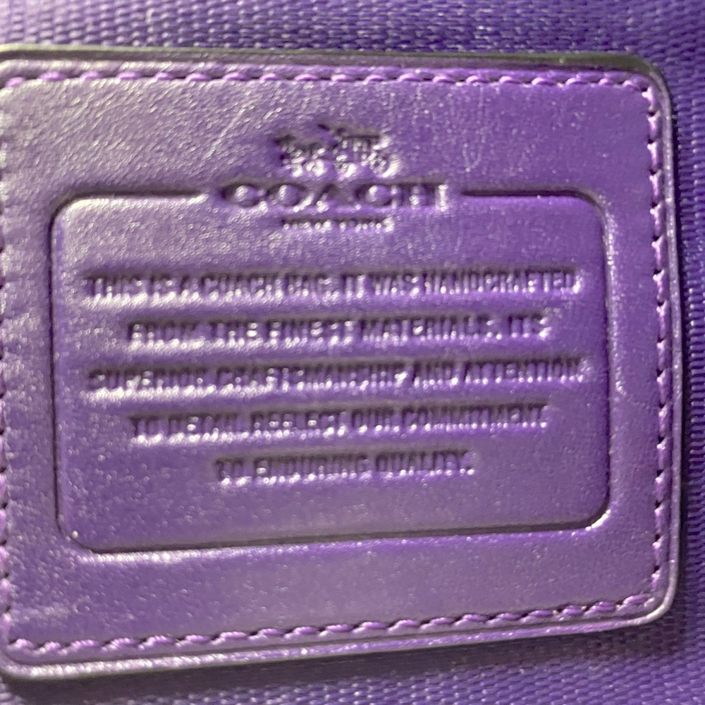 Purple smooth leather hand bag like new with dust bag and shoulder option